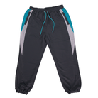 Black track pants, front view